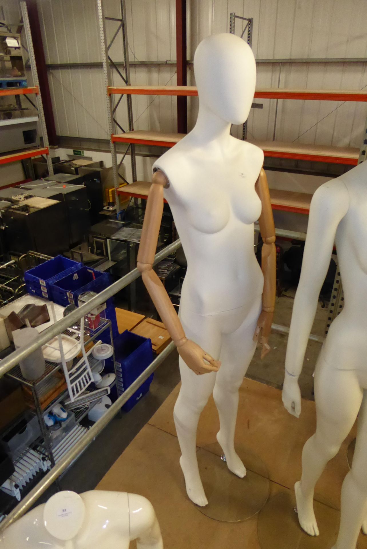 * Quality female mannequin with articulated wooden arms on stand