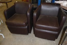 * Two brown tub chairs