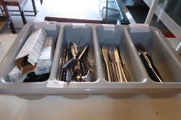 * cutlery tray with quantity of cutlery