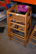 * Pair of wooden children's highchairs