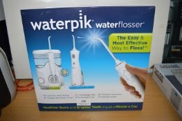 *Waterpik Tooth Flosser