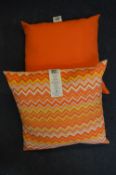 *Two Orange Cushions