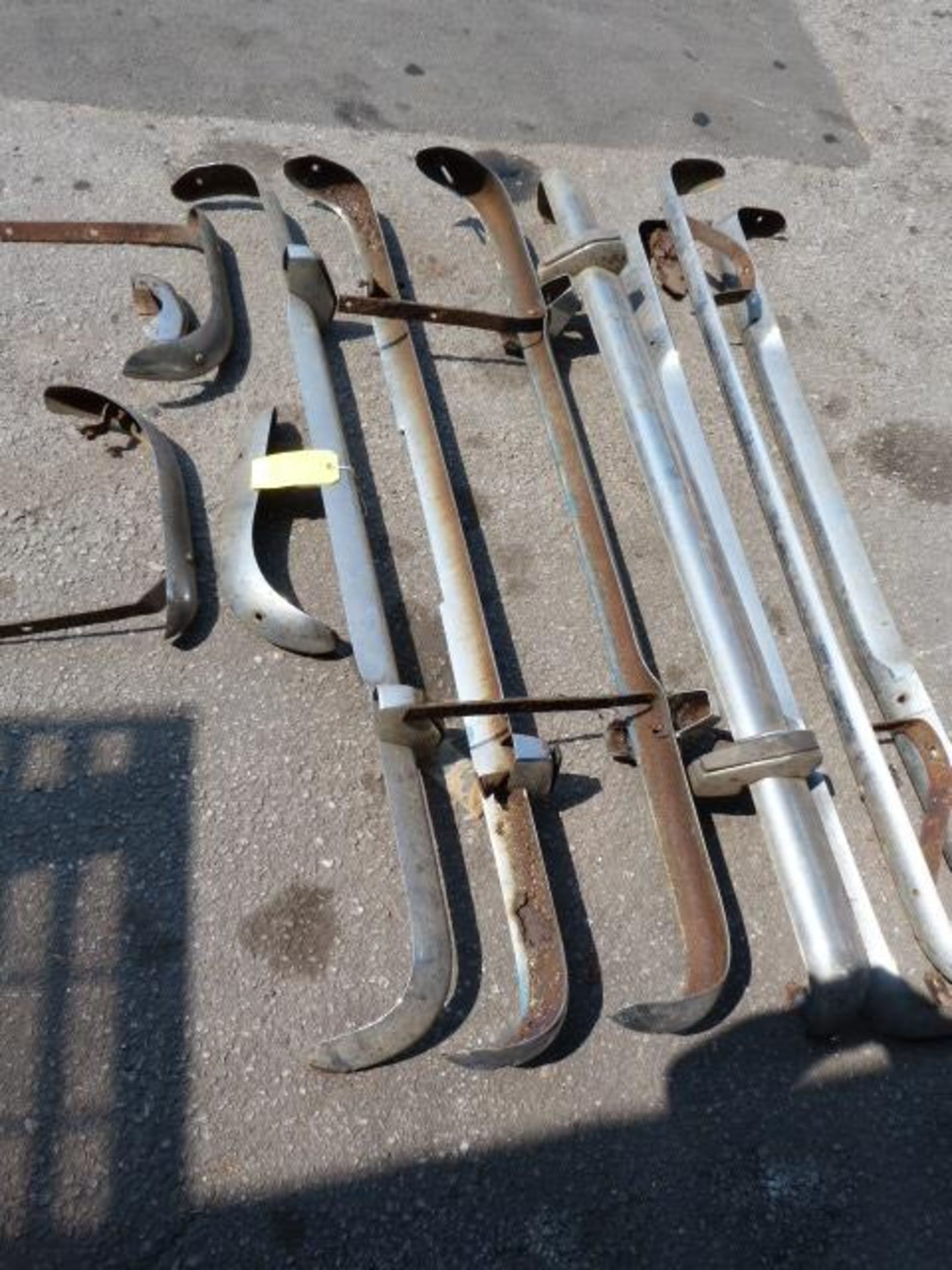Selection of Escort Mk1 Bumpers Including Front & Rear in Chrome