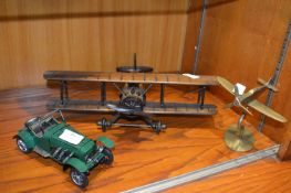 Wooden Model Aeroplane, Brass Plane, and a Car