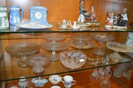 Eight Glass Cake Stands and a Fruit Bowl