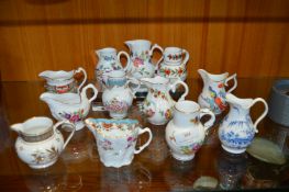 Twelve Royal Worcester Miniature Jugs