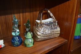 Two Mdina Glass Paperweights and a Murano Handbag