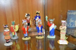 Eight Royal Doulton Bunnykins Figurines - Uncle Sam, Beefeater, etc.