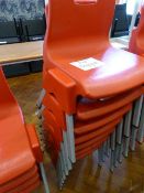 *Seven Child's Red Plastic Stackable Chairs