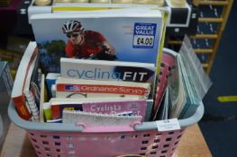 Small Basket Containing Cycling Books and Magazine