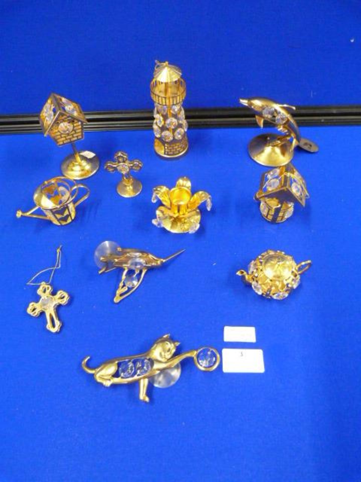 Ten Swarovski Gold Plated Miniatures