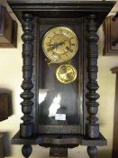 Vintage Wood Cased Wall Clock with Carved Columns and Decoration