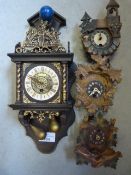 Three Miniature Cuckoo Clocks and an Antiques Style Plastic Wall Clock