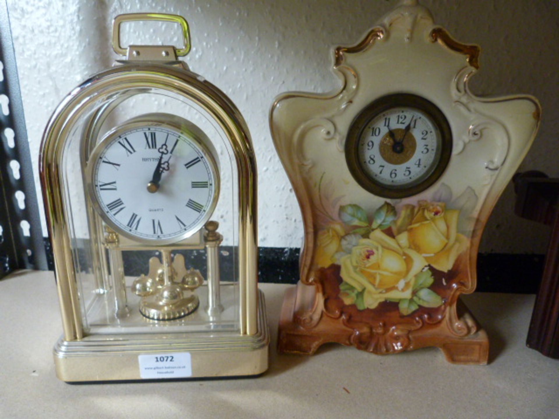 Brass Effect Plastic Domed Clock and a Decorative Glazed Floral Clock
