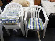 Four Plastic Garden Chairs with Cushions