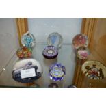 Nine Glass Paperweights including Caithness