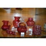 Six Cranberry Glass Jugs etc.