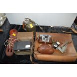 Diver Cast Iron Boot Weight, Vintage Cameras, Leather Satchel, etc.