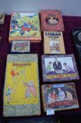 Vintage Jigsaw Puzzles, Snakes & Ladders, and a Branco Mechanical Acrobat