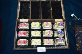 Set of Twelve Royal Doulton Floral Napkin Ring in Case