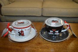 Two Christmas Cups & Saucers