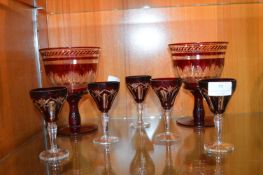 Two Large Cranberry Glass Runners and Wine Glasses