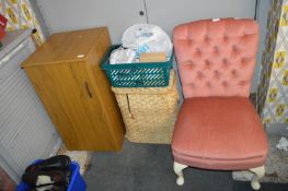 Storage Cupboard and Contents, a Linen Bin and Con
