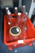 Six Glass Kitchen Storage Bottles and a Jar