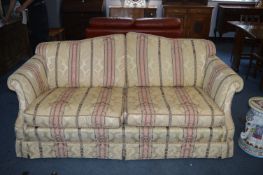 Two Seat Sofa with Pink and Cream Upholstery