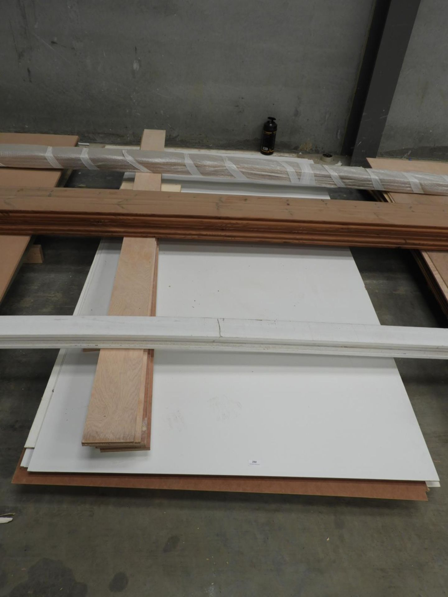 *Twelve Sheets of Faced Plywood, Hardboard, and Other Sheet Material