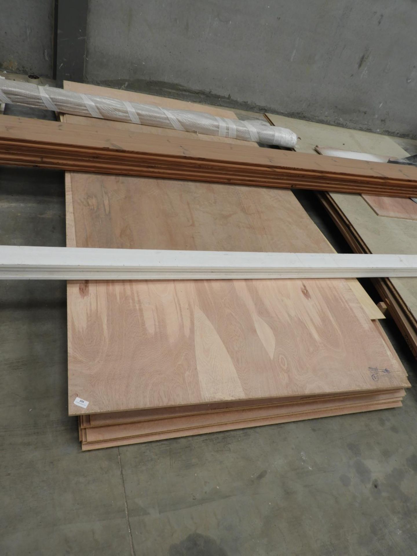 *Twelve Sheets of Hardboard and Various Pieces of Plywood Sheeting
