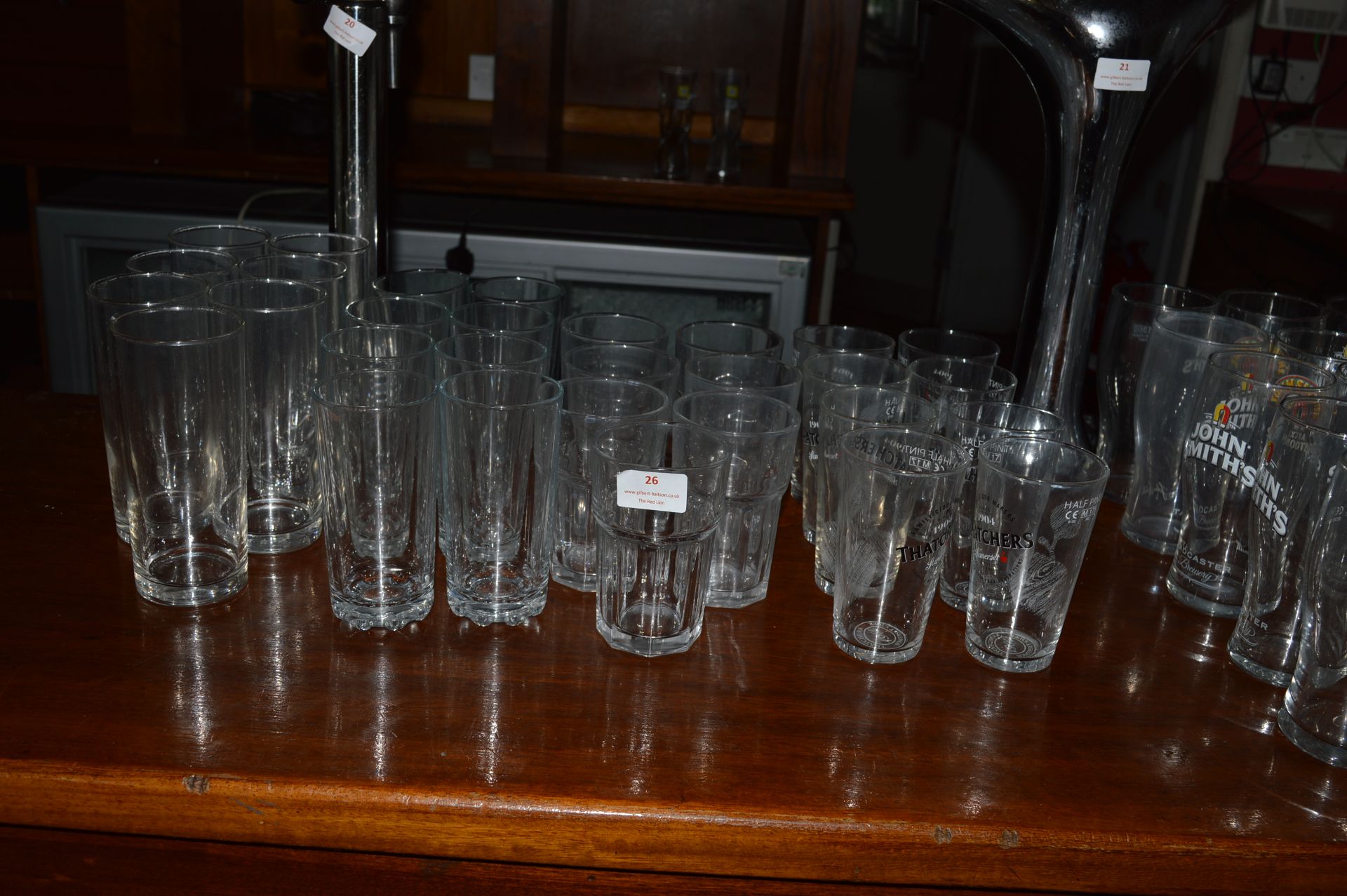 Assorted Branded and Unbranded Half Pint Glasses and High Ball Tumblers