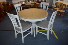 Extending Circular Dining Table with Four Matching Chairs