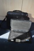 Dell LKXGBD Laptop with Case