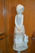 Nao Figurine - Girl with Basket of Chicks