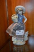 Lladro Figurine - Girl with a Basket of Flowers