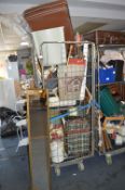 Cage of Household Goods; Mirror, Luggage, Rugs, La