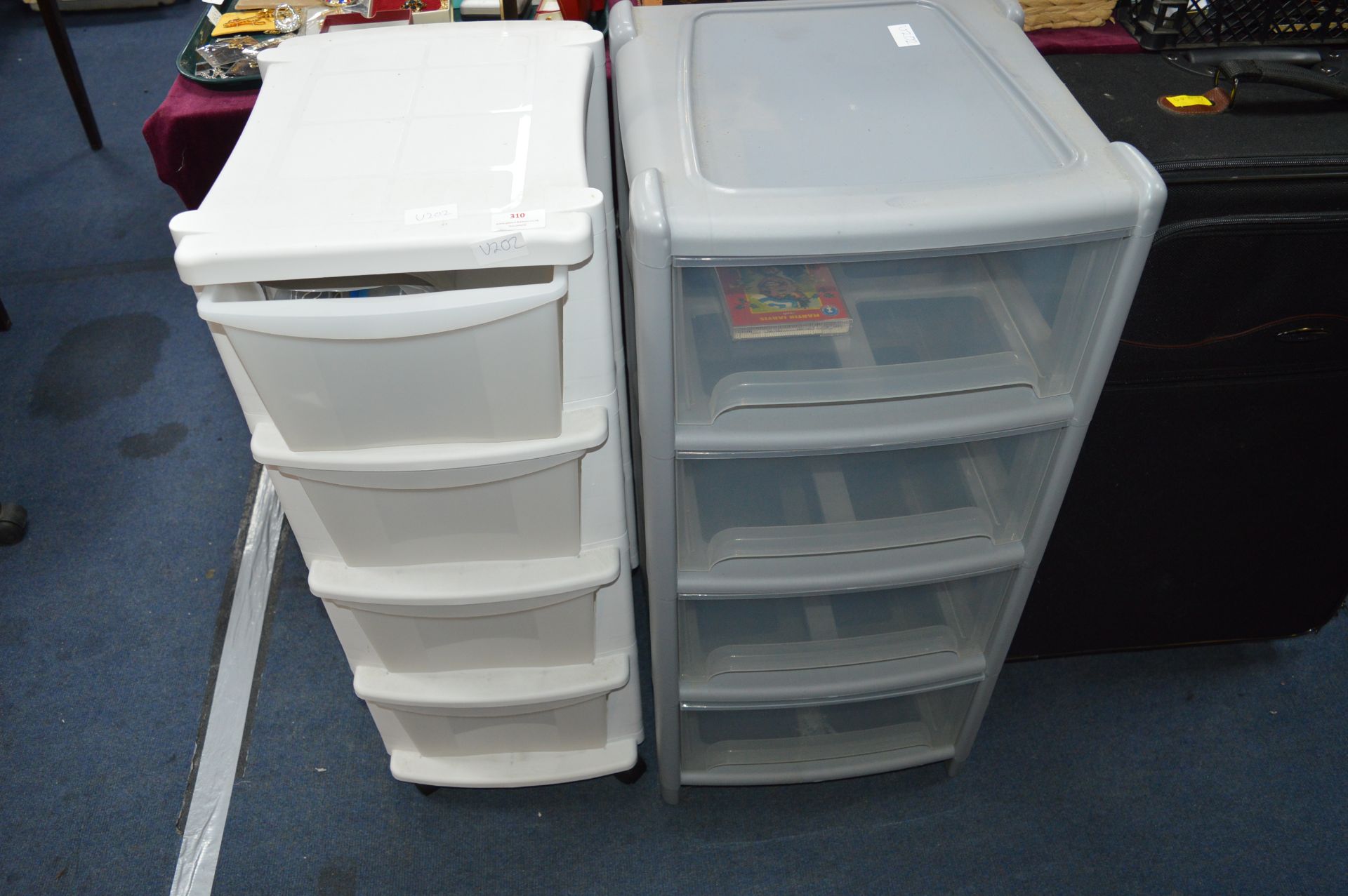 Two Four Drawer Plastic Storage Units