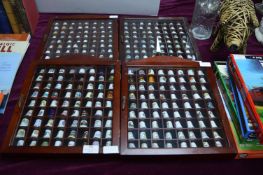 Four Framed Display Cases Containing Thimbles
