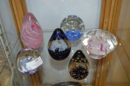 Six Glass Paperweights