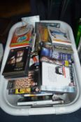 Laundry Basket Containing DVDs