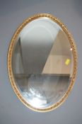 Gilt Framed Beveled Edge Oval Mirror