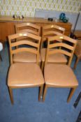 Four Nathan Teak Dining Chairs