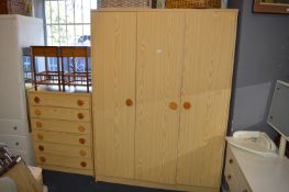 Pine Effect Triple Wardrobe and Six Drawer Bedroom