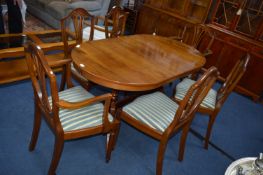 Extending Oval Dining Table with Four Dining Chair