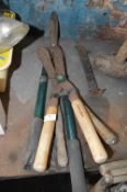 Three Sets of Hedge Shears