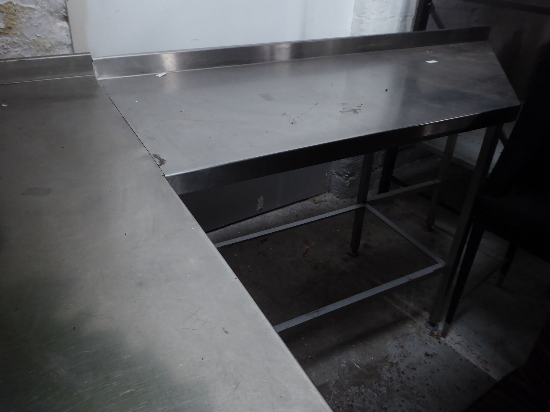 *large l-shaped stainless steel workbench with up stand 650 deep x 1800 x 2300 to point$