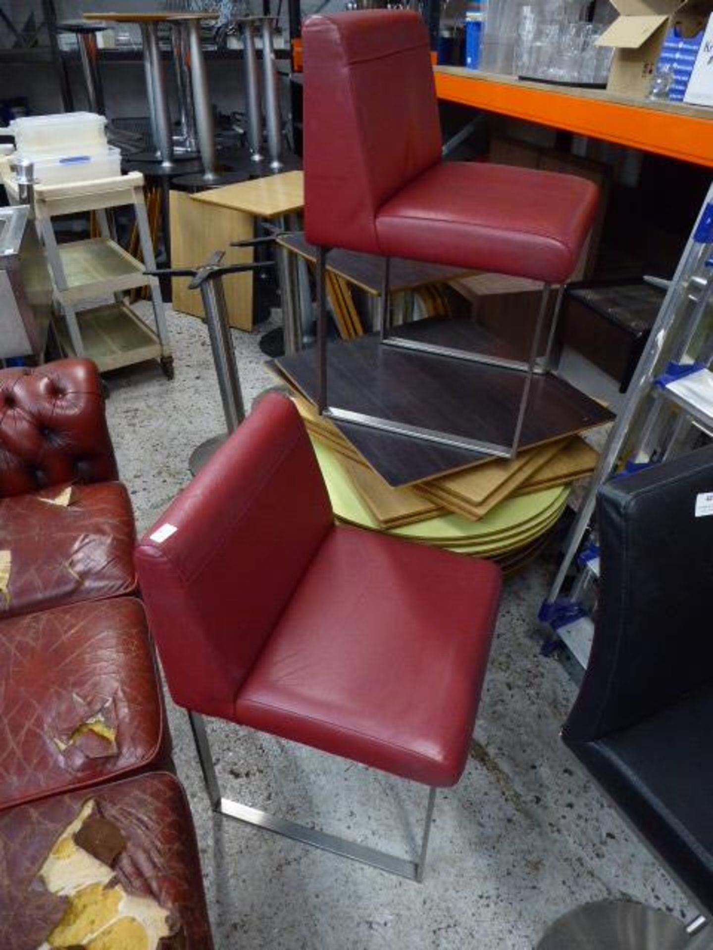 *pair of red leatherette reception chairs on stainless legs