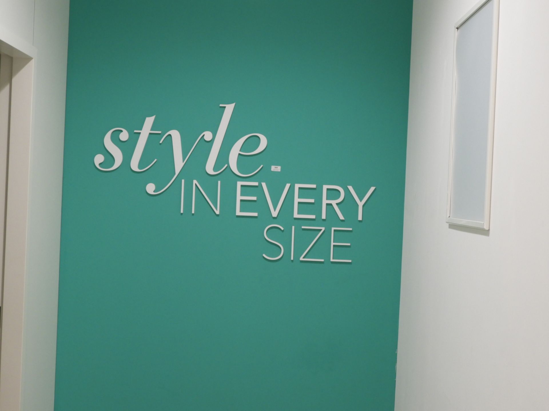 *Wall Sign "Styles in Every Size"