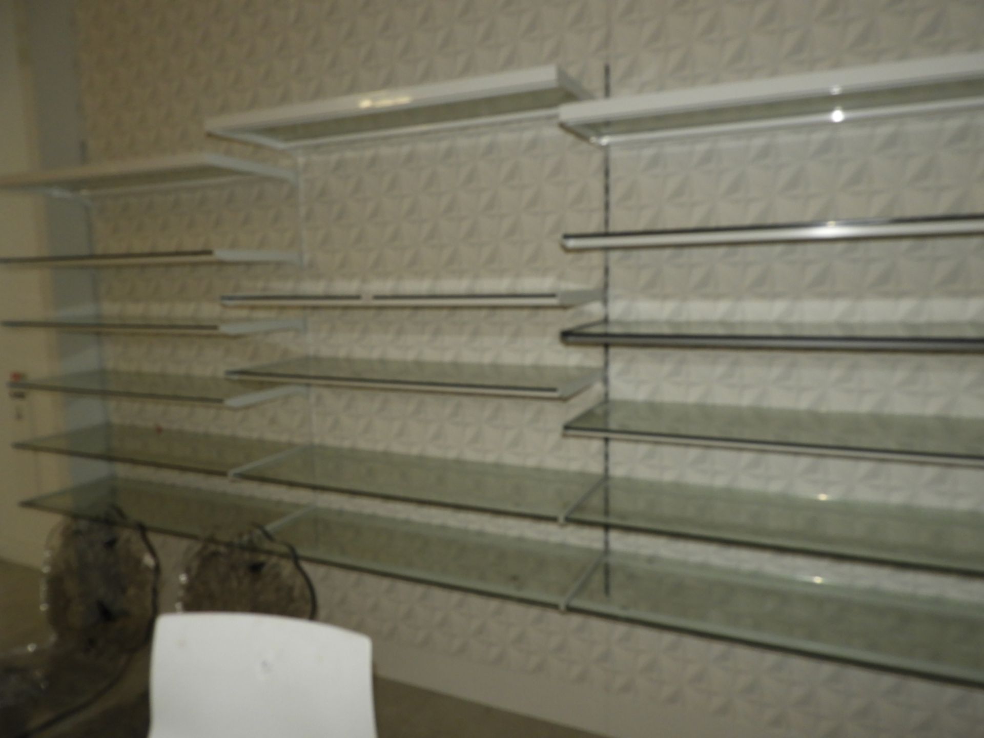 *Seventeen Wall Mounted Plate Glass Shelves (wall